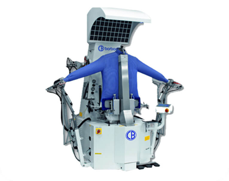 Piing professional carefully handling garments to ensure the highest quality care and attention to detail